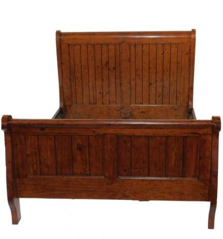 An Irish Coast Collection Queen size stained pine bed