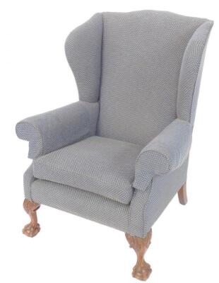 A Georgian style mahogany wingback armchair