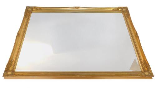 A rectangular gilt wall mirror