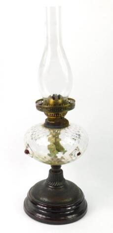 A duplex copper and glass oil lamp