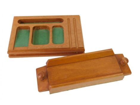 Two mid 20thC teak desk tidies