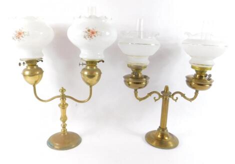 Two brass twin branch candelabra oil lamps