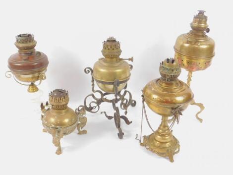 Five 19thC and later English and Continental brass oil lamps