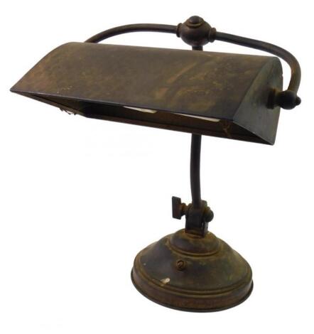 An early 20thC copper and cast iron angular desk lamp