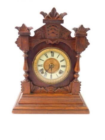 An American oak cased mantel clock