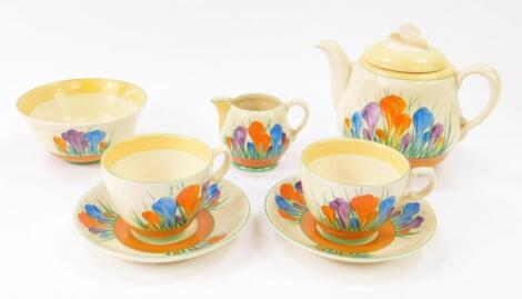 A Clarice Cliff pottery tete-a-tete decorated in the Autumn Crocus pattern