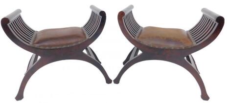 A pair of hardwood savanarola stools