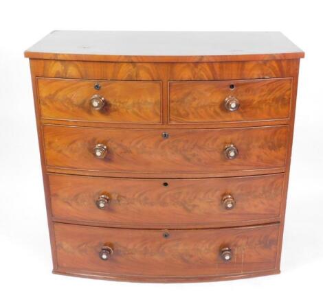 A Victorian bow front chest of drawers