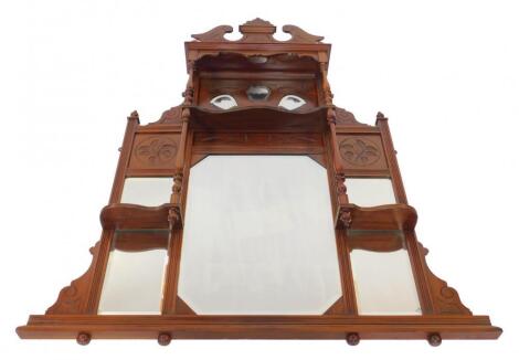 A Victorian walnut overmantel mirror