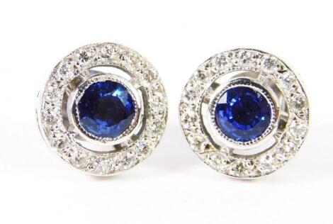 A pair of sapphire and diamond earrings