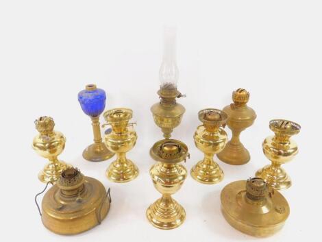 Six brass oil lamps