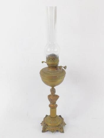 An early 20thC copper and brass oil lamp