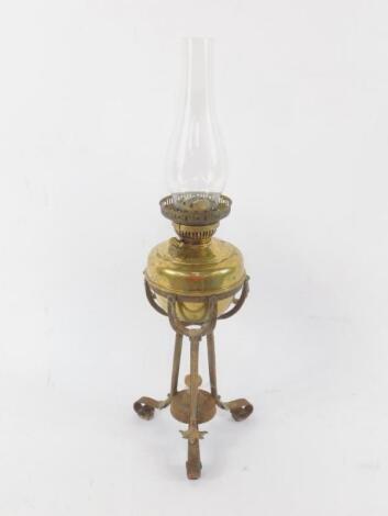 A Neo classical style cast iron and brass oil lamp