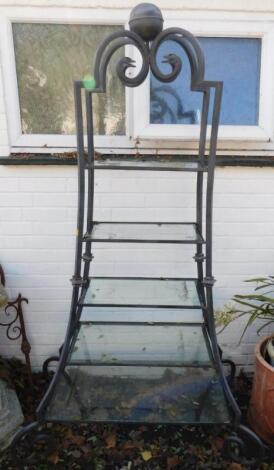 A cast iron conservatory whatnot