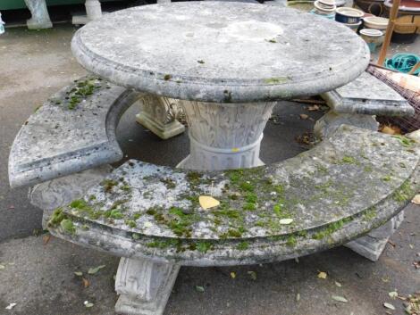 A faux marble circular garden table