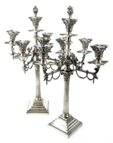 A pair of 20thC silver plated four branch five light candelabra