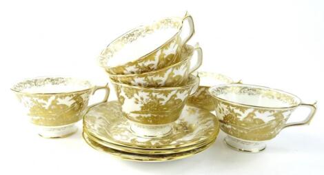 A Royal Crown Derby gold Aves pattern part tea service