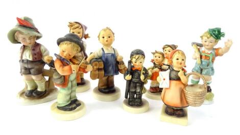 A collection of Hummel figures