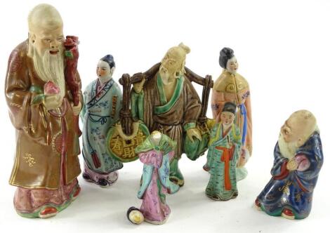 A collection of mainly souvenir oriental ceramic figures