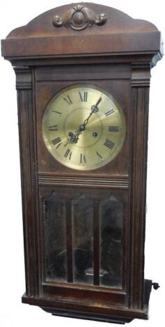 An early 20thC mahogany wall clock
