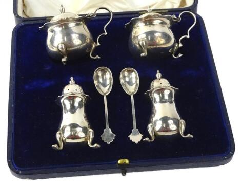 A Edward VII silver four piece cruet