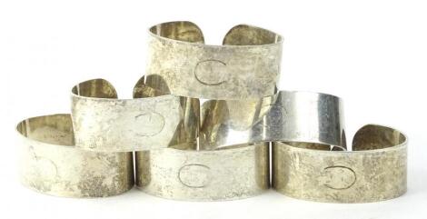 A set of six silver napkin rings