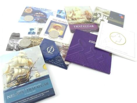 Six five pound commemorative coin sets