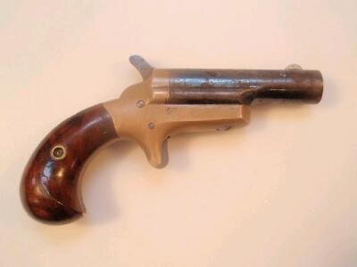 A Colt .41 calibre Derringer Rim Fire pocket pistol