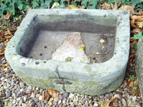 A D shaped hewn stone sink or planter