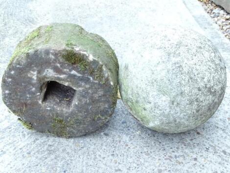 A carved stone circular ball or finial