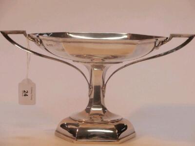 A George V silver pedestal dish of hexagonal dished form with tendril shaped