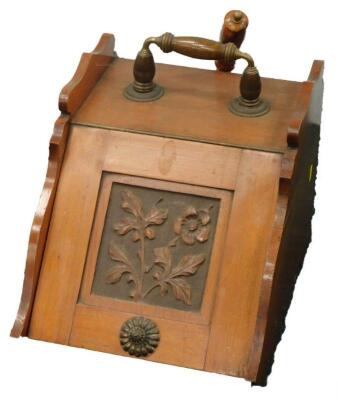 An Edwardian walnut coal scuttle