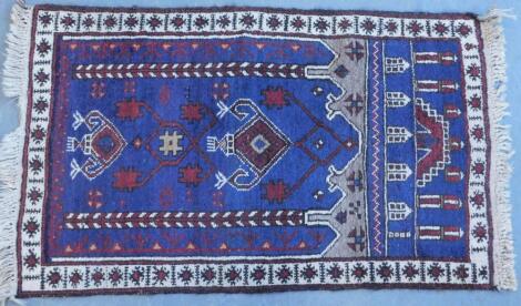 A Persian style prayer rug