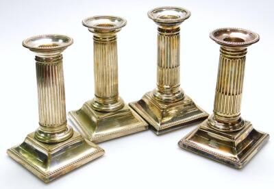 A set of four early 20thC classical design squat candlesticks - 5