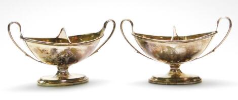 A pair of Victorian silver two sectional salts