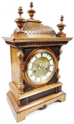 A late 19thC walnut mantel clock