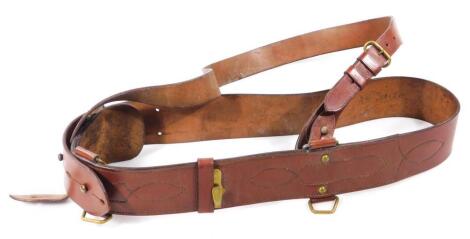 A brown leather Sam Browne type belt