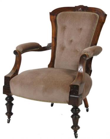 A late Victorian walnut armchair