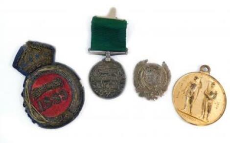 A Queen Victoria Long Service Volunteer Force Medal awarded to Bugler R Sharpe