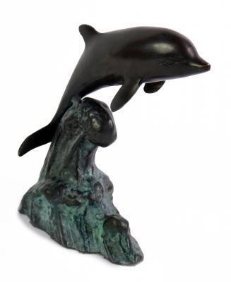 A bronze sculpture of a dolphin