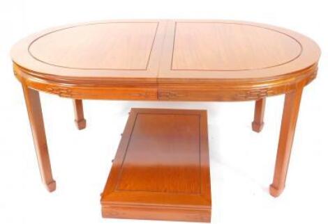 A Chinese oval draw leaf dining table