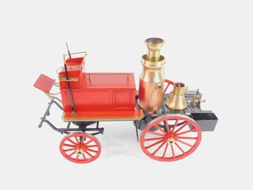 A steel and brass steam model of a Victorian horse drawn fire engine