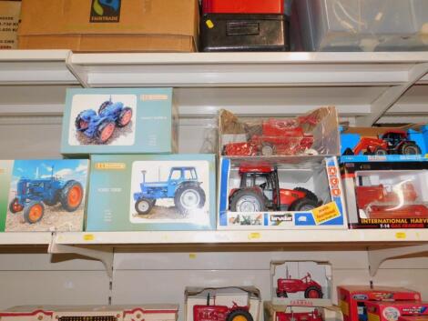 Universal Hobbies die cast models of County Superford and Ford 7000 tractors