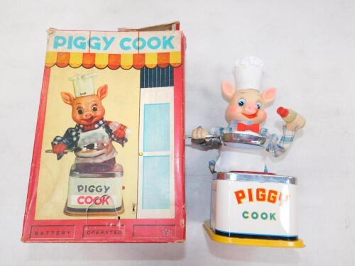 A Japanese battery operated tin plate Piggy Cook