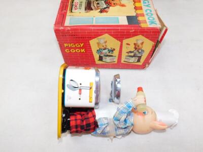 A Japanese battery operated tin plate Piggy Cook - 2