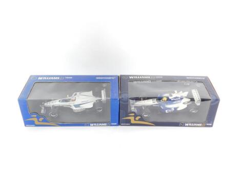 Two Minichamps scale models of racing cars