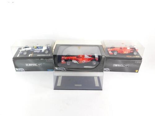 Three Hotwheels racing cars: scale 1:18