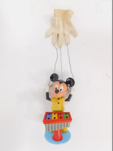 A Kohner Bros hand puppet of Mickey Mouse playing a xylophone