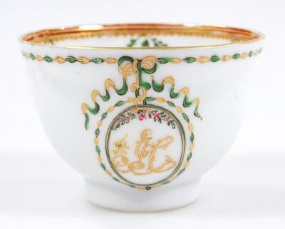 An 18thC Chinese export armorial tea bowl and saucer - 4