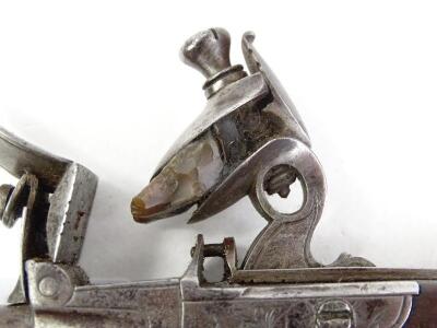 A pair of 19thC flintlock pistols - 4